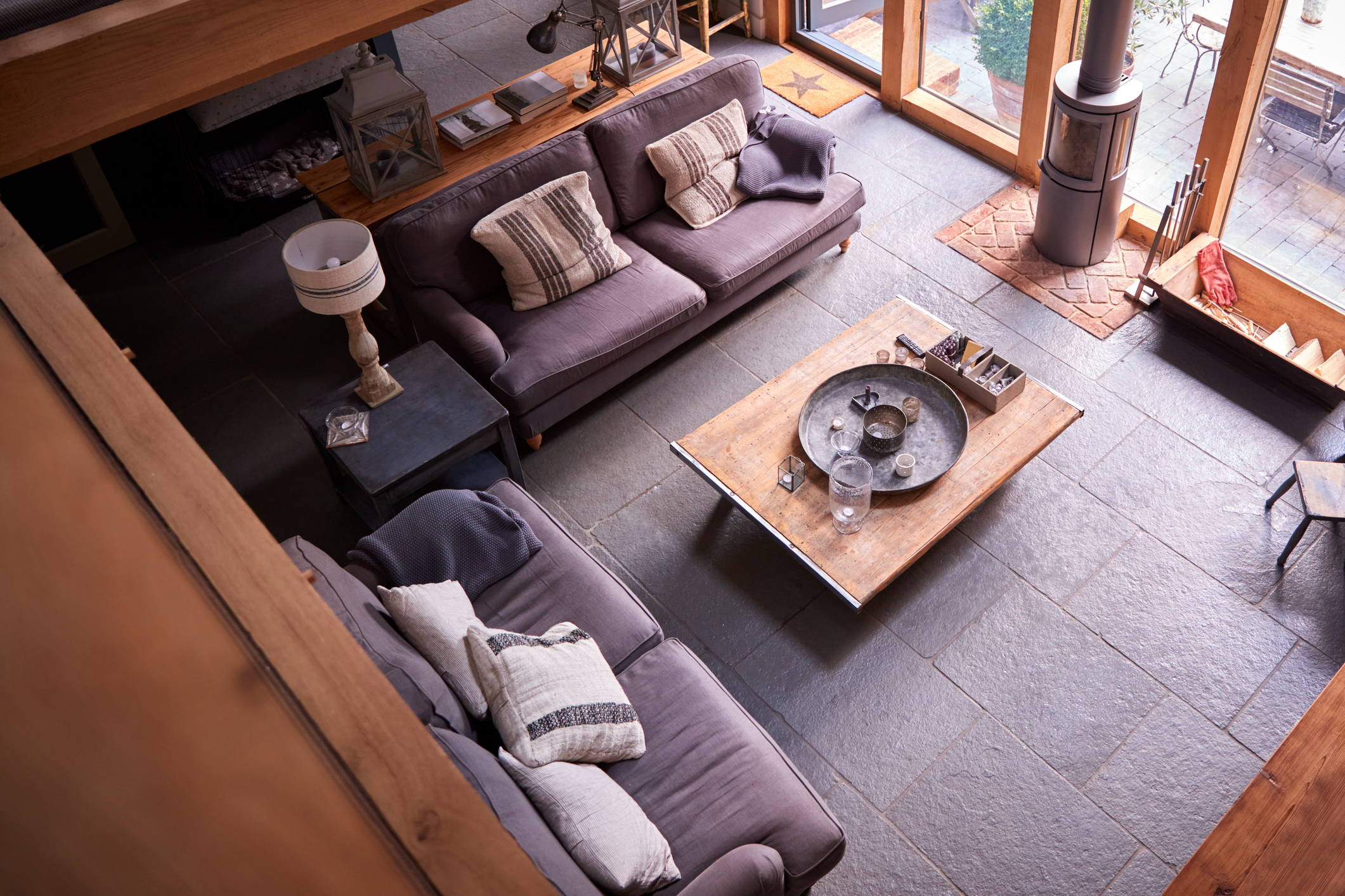 Overhead Shot Of Lounge In Modern Open Plan House Or Apartment With Sofas And Table